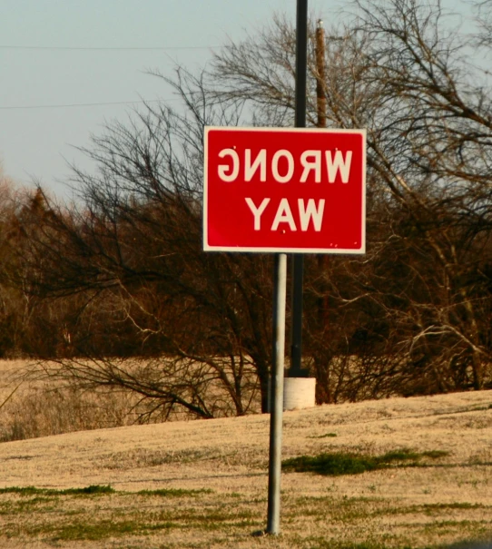 a wrong way sign in the desert