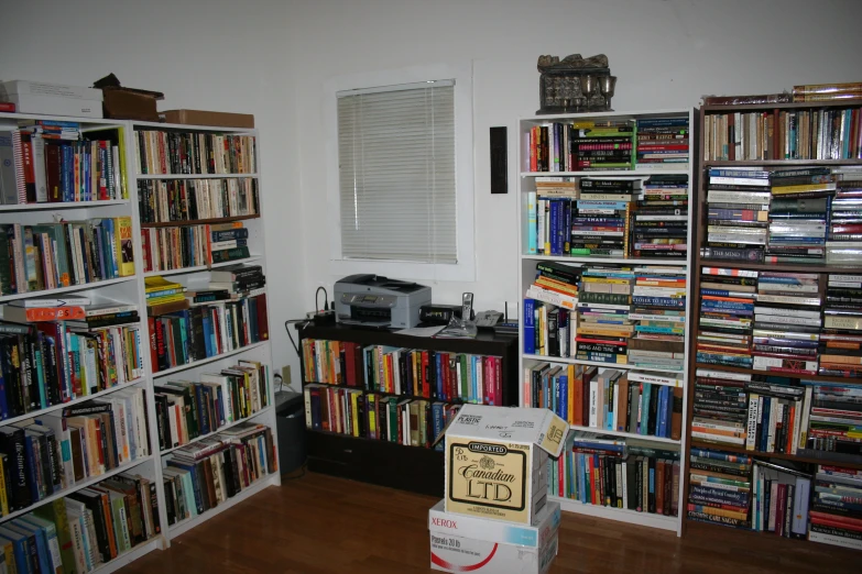 there is a bookcase that has books all over it