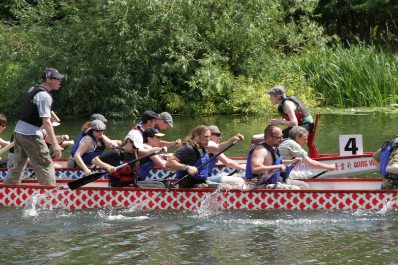 there is a canoe with some people in it