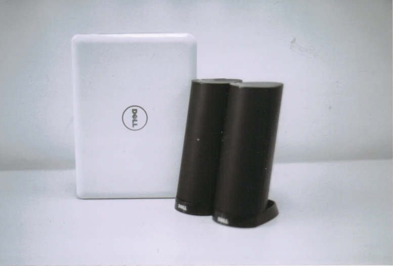 two electronic devices sitting on a table top