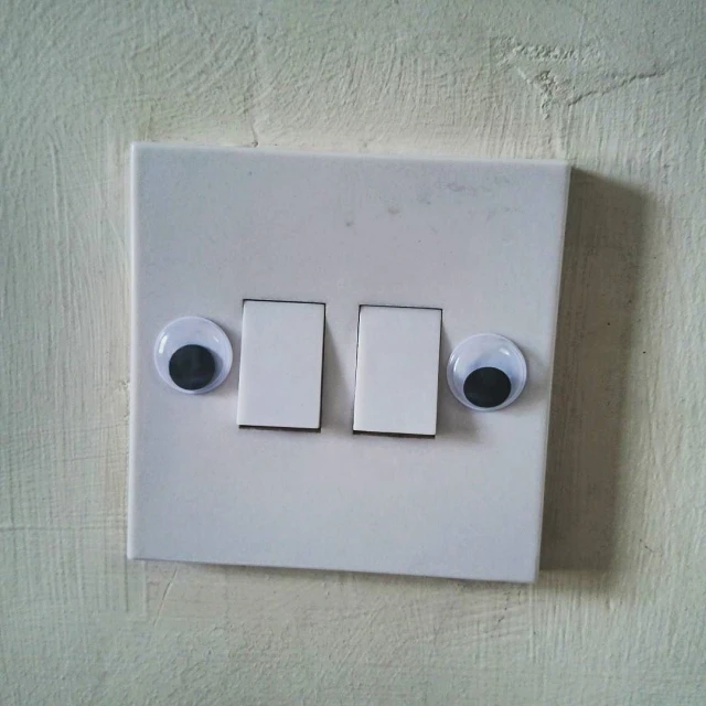a close up view of a two way light switch