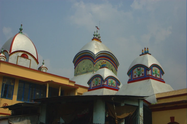 a church with colorful painted decorations and tall steeple