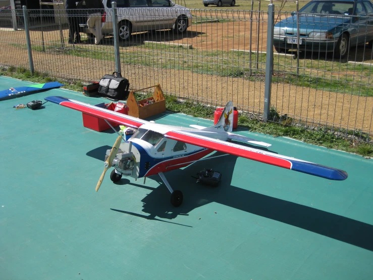 a toy airplane sitting on top of a metal table