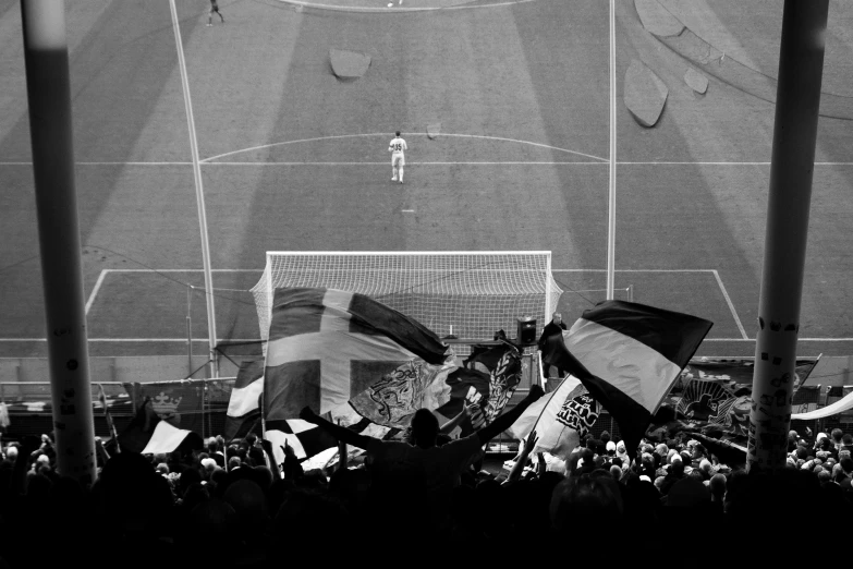 there are lots of fans on the soccer field