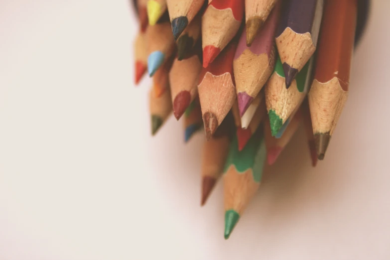 several pencils sitting side by side in order to go