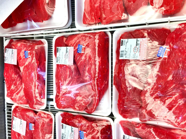 raw meat for sale in freezers at a store