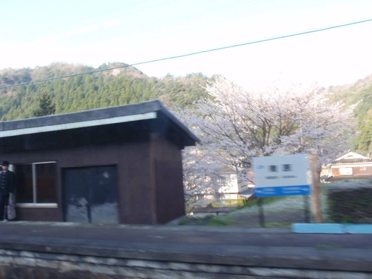 the train platform is empty of people standing in front