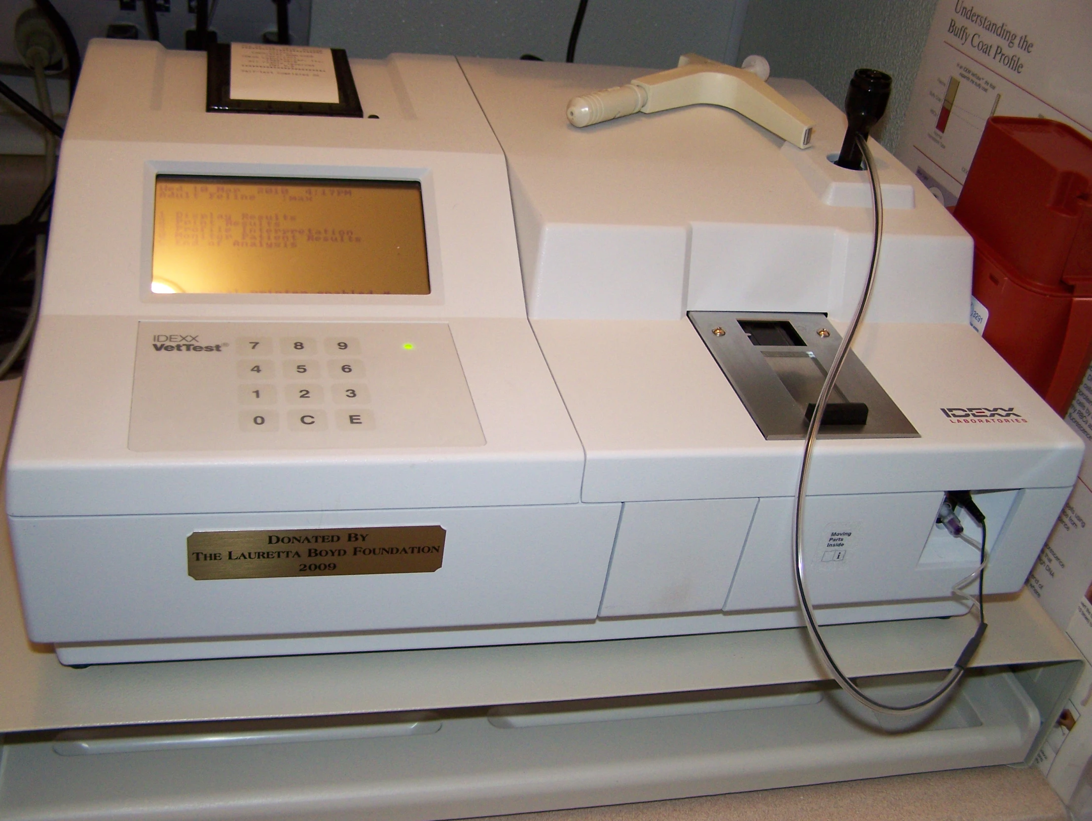 a white machine with a white keyboard on it