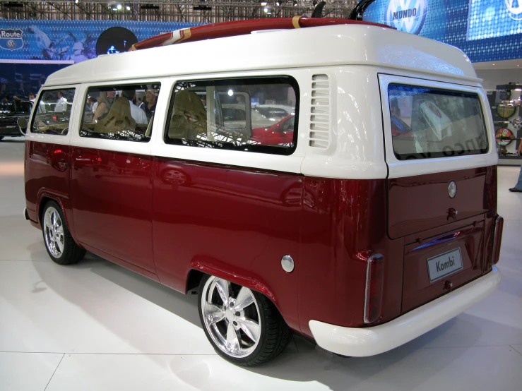 an old vw bus is on display at a show