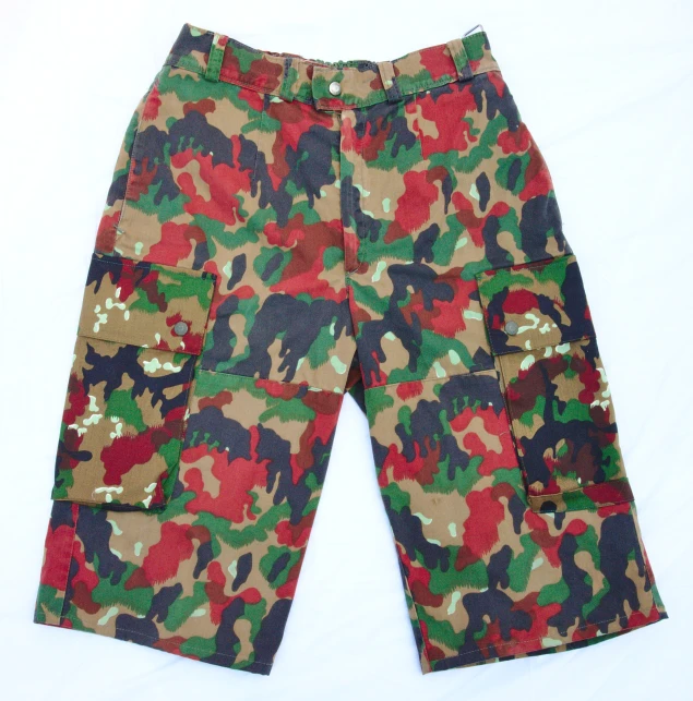 a short shorts with a pattern of red, green, and black