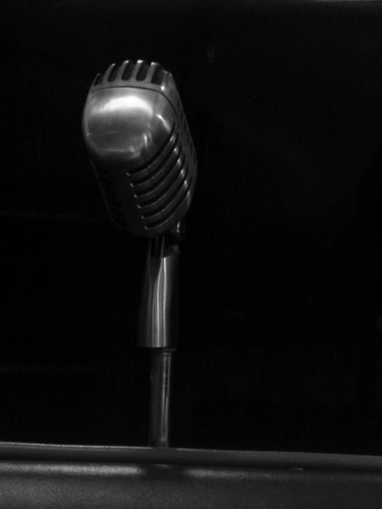 a close up image of a microphone on a stand