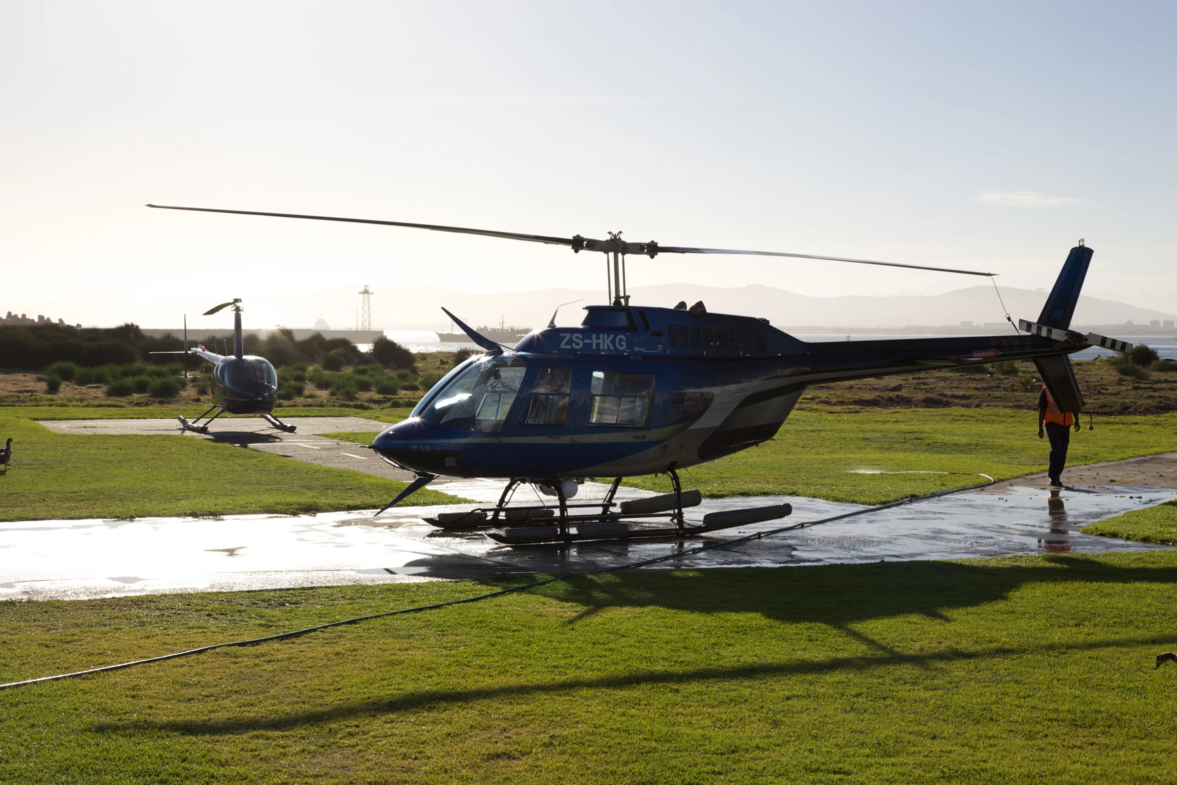 a helicopter that is parked in the rain