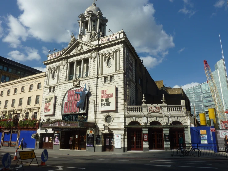 an old building that has a tall clock on it