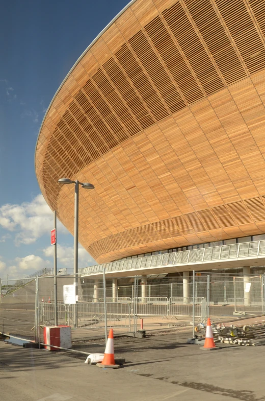 the large circular building has a wooden roof