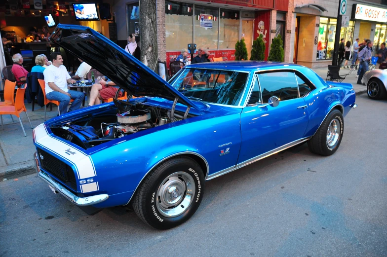 a car is parked on a city street