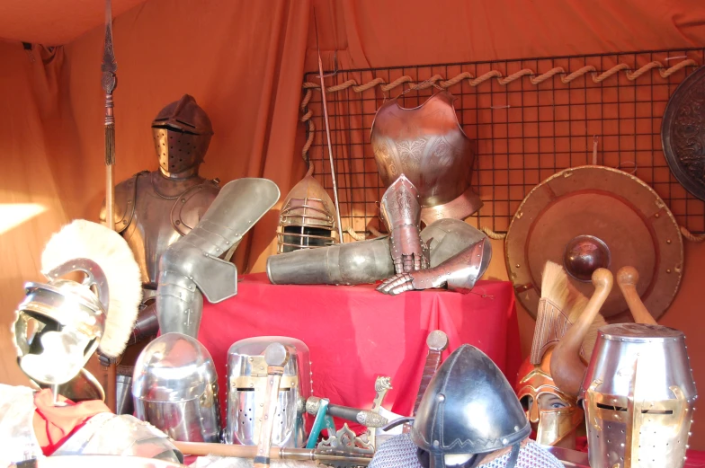 a display with several different types of medieval armor