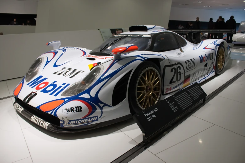 a white race car with a number twenty on it