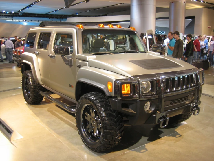 a hummer is shown on display in a museum