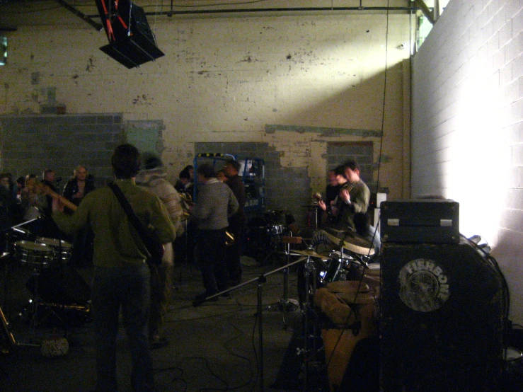 a band playing in a dimly lit room