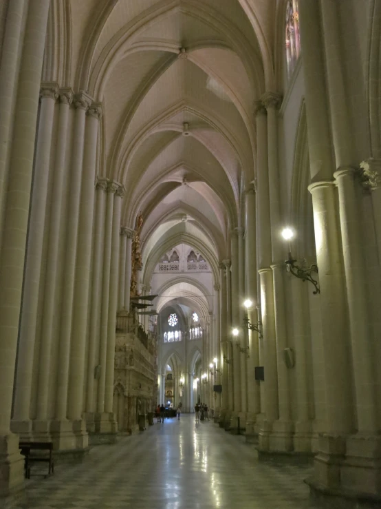 the inside of a building with large columns