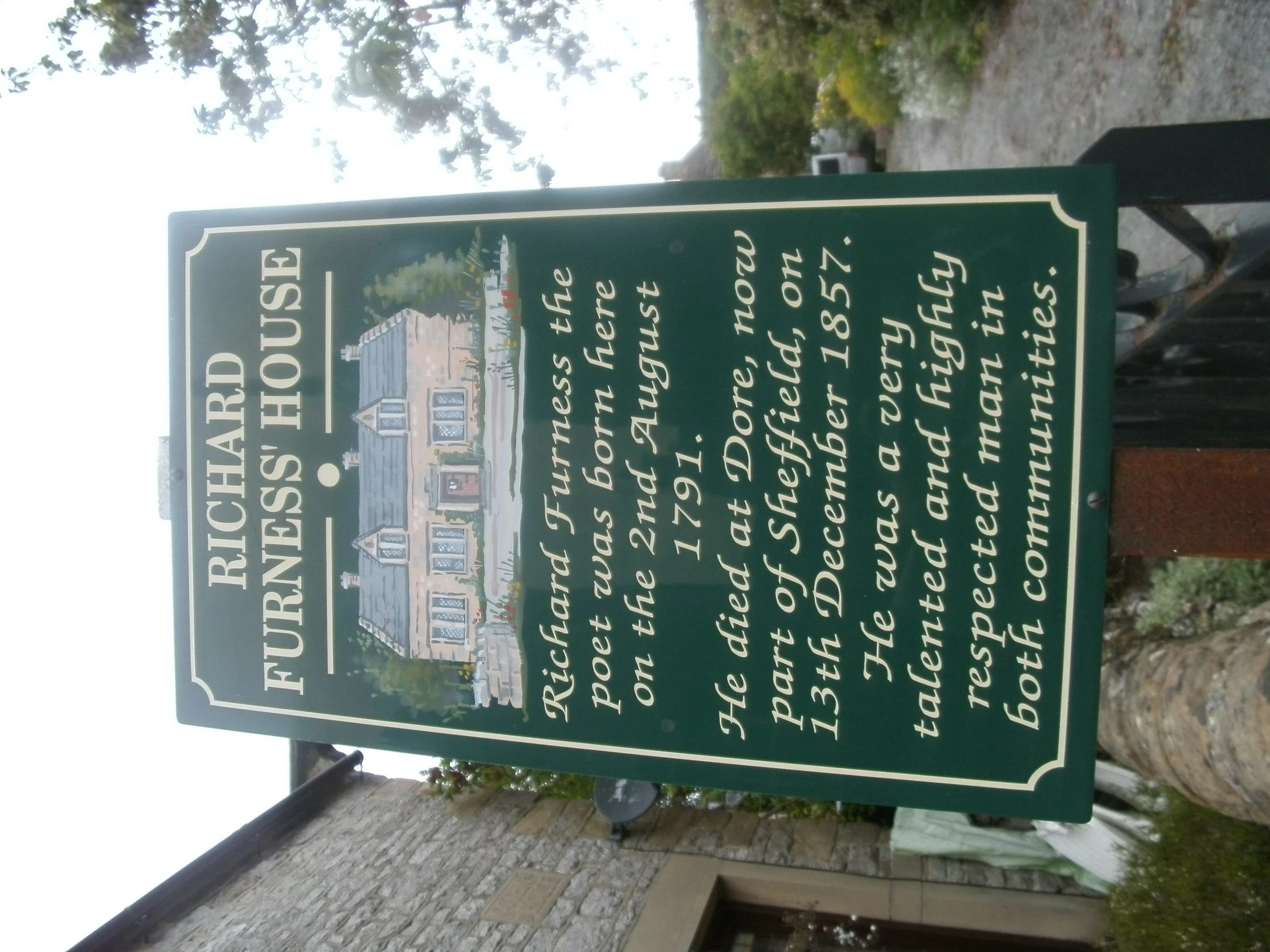 there is a sign about the historical buildings