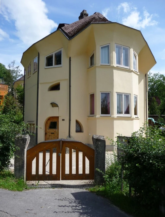 a house has a large gate at the front