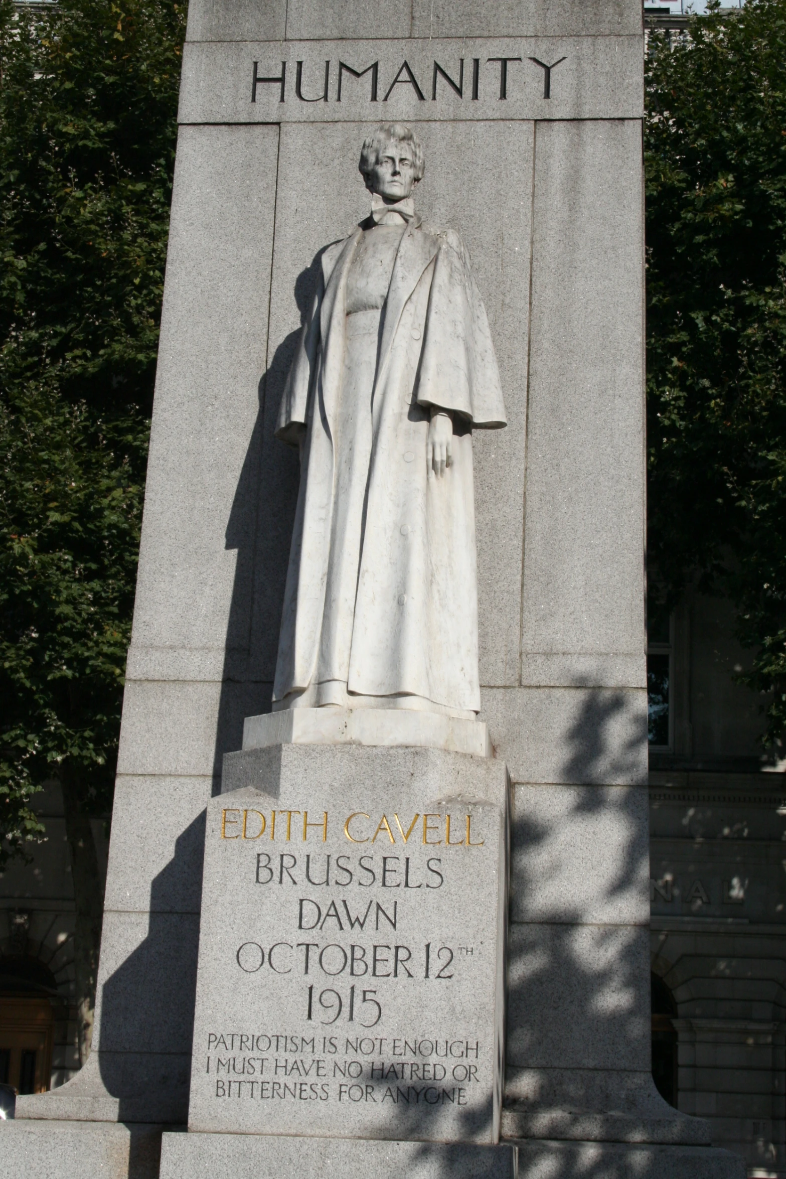 a statue on the side of a monument