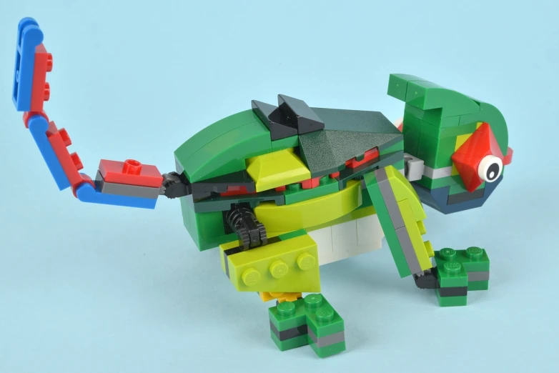 a turtle in a lego building with a large body and green, yellow, red and blue brick
