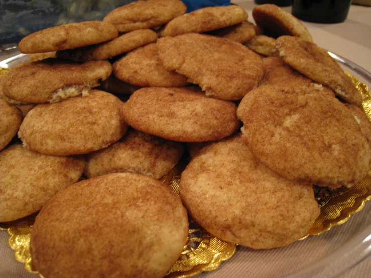 a large plate of biscuits on top of a table