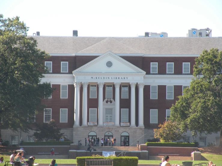 the front entrance of a large brick building