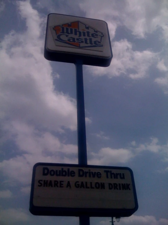 the double drive thru sign and share a gallon at minute's castle