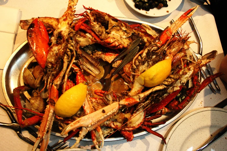 crabs in a bowl are ready to be cooked