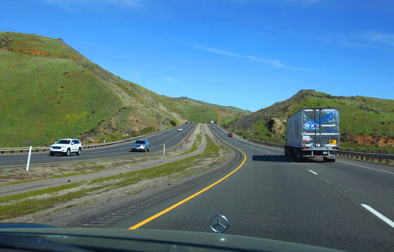 the back of a truck driving down a highway