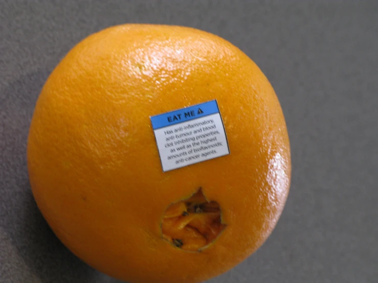 an orange that is sitting on a table