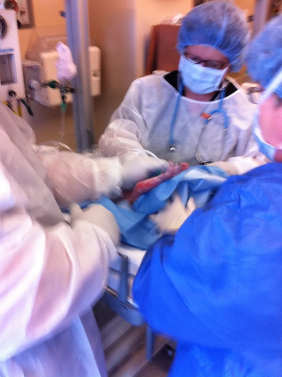 two surgeons operating on an operation with each other