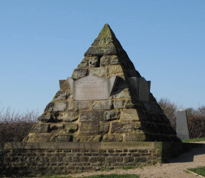 a cemetery with a small triangular triangle on it