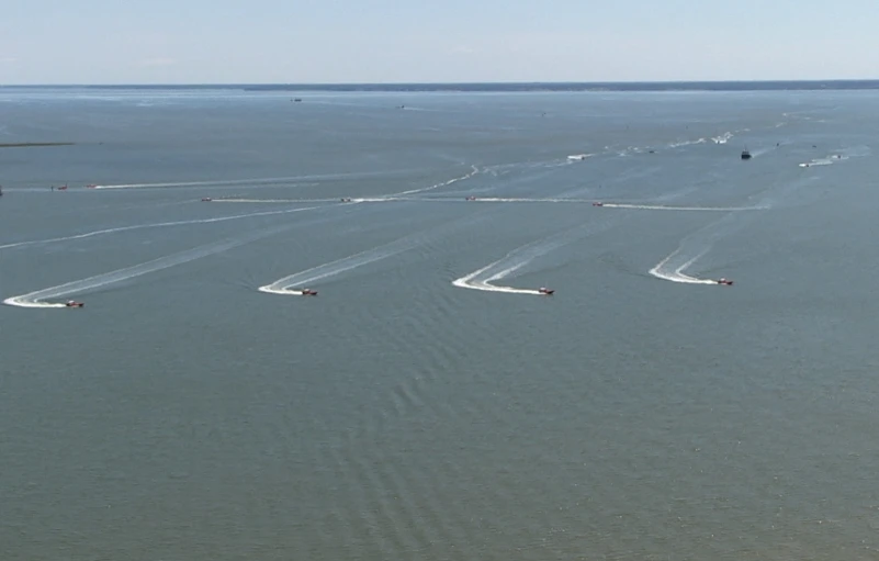 a view from the air of boats on a body of water