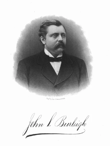 a black and white pograph of a man with a mustache