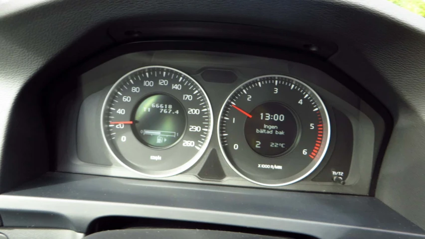 the gauges are displayed on the dashboard of this vehicle