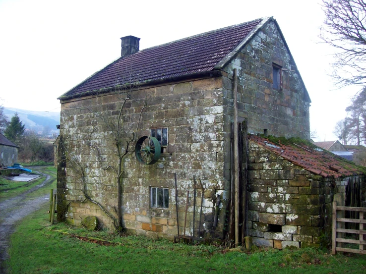 a house with an old window and a clock on the door