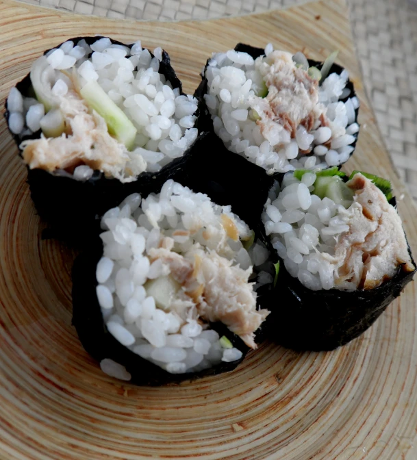 there are sushi rolls that have been placed on the plate