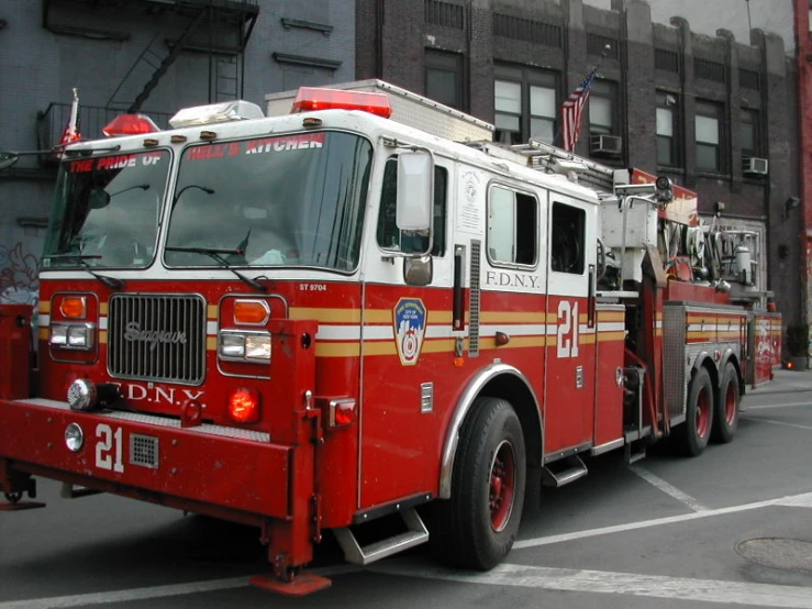 a fire truck is parked in front of a building