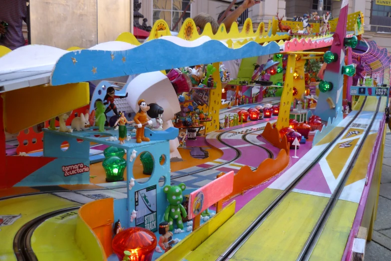 a colorful display of miniature toy train tracks