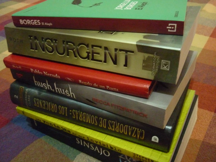 a stack of books that are sitting on top of each other