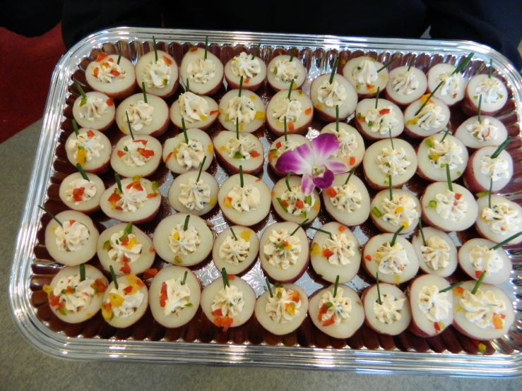 an array of food items on display in a tray