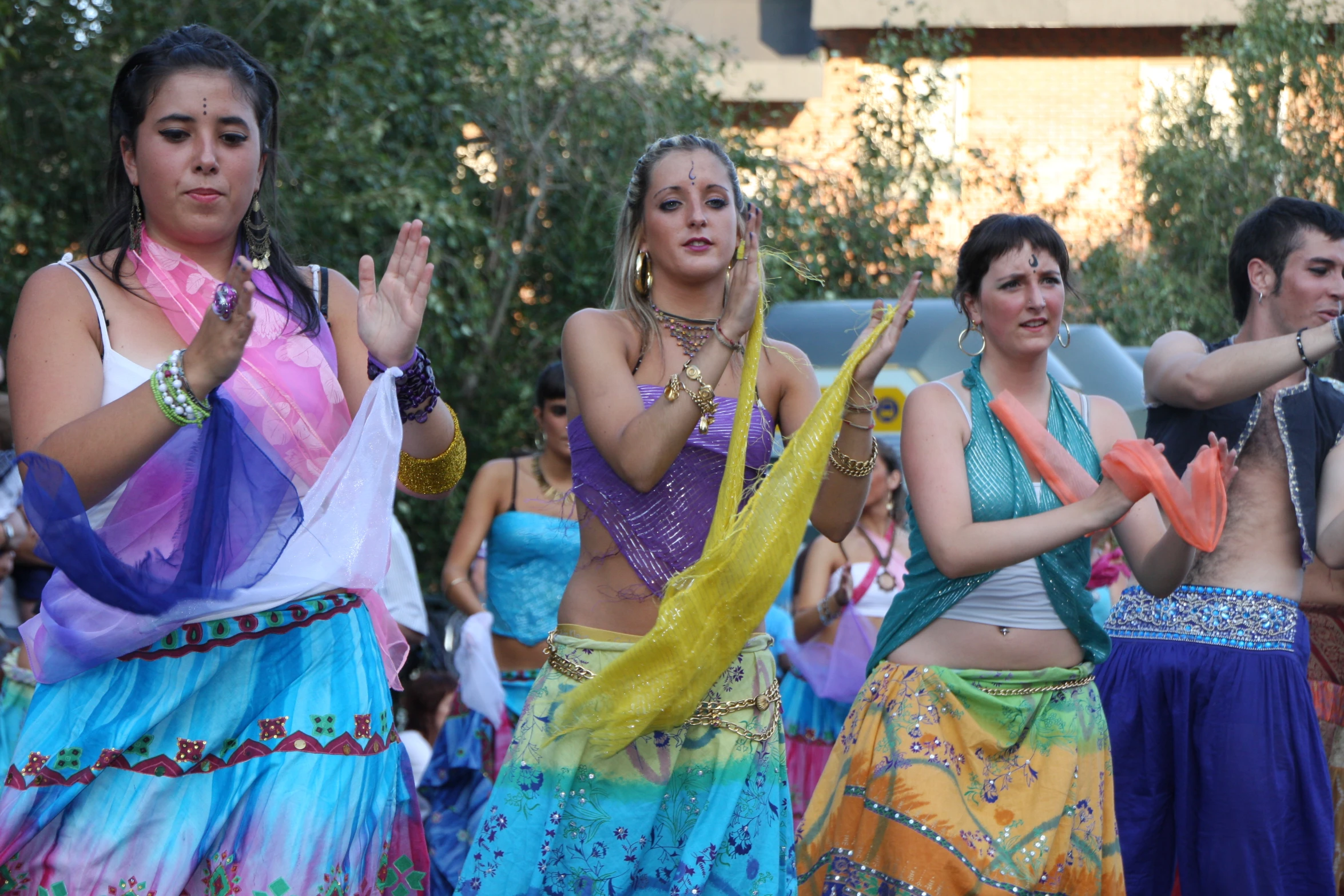 there are many women that are dancing together