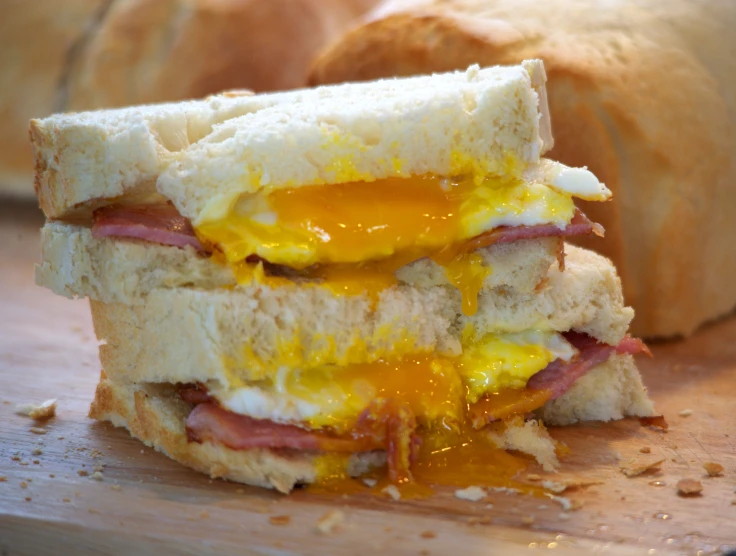 sandwich with ham, egg and a bun cut in half