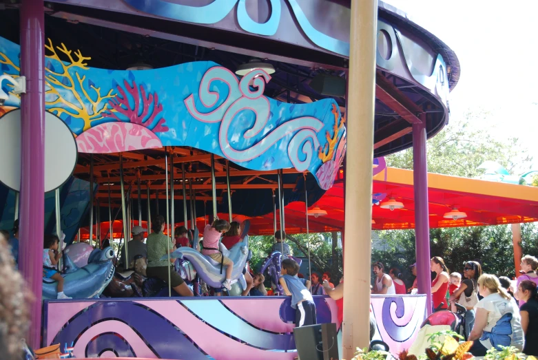 a child's ride that looks like a mermaid