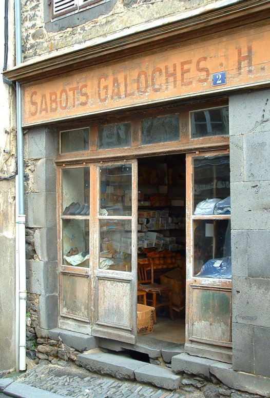 a shopfront on the corner of a small street