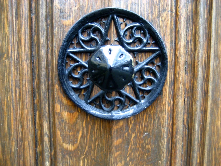 a decorative door  that has been carved into a door